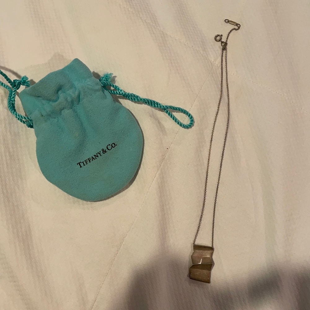Tiffany and co silver necklace. Needs to be pol.